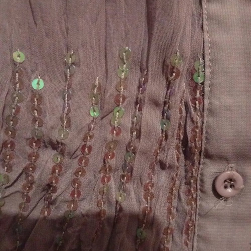 Shirt new size medium with sequins and impressive design