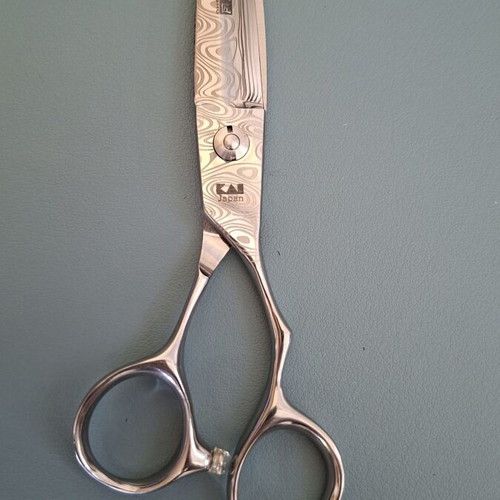 Hairdressing scissors lightly used