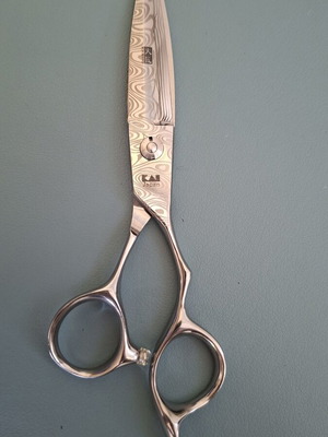Hairdressing scissors lightly used