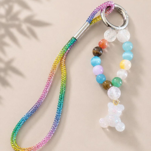 Handmade keychain with colorful beads and resin bear