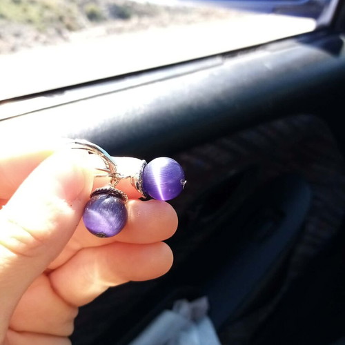 Purple dangle earrings like new with deep purple stones