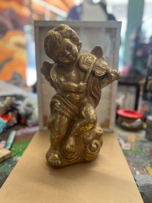 Ceramic angel figurine like new with gold leaf
