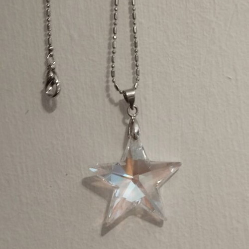 Star necklace with silver chain like new