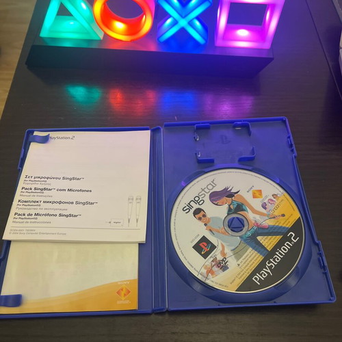 SingStar PS2 game used with manual