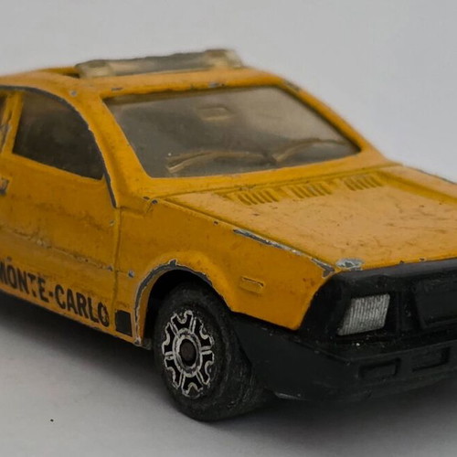 Majorette Lancia Monte Carlo toy car yellow 1980s #285