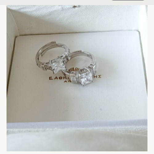 Galerie Tsangarakis rings with white sapphires like new, plated silver