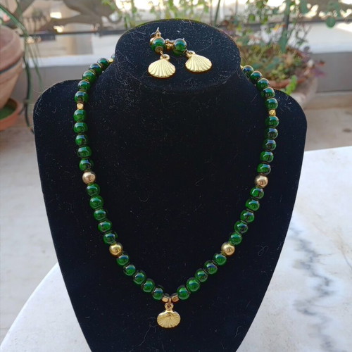 Handmade necklace set with beads and gold shell motifs like new
