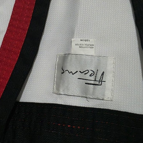 Daedo Taekwondo uniform size 150, white with red and black collar