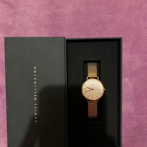 Daniel Wellington women's watch used with gold bracelet