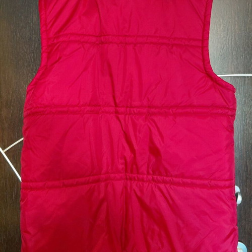 Sleeveless jacket new, size L