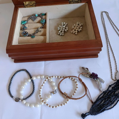Vintage wooden jewelry box with jewelry used