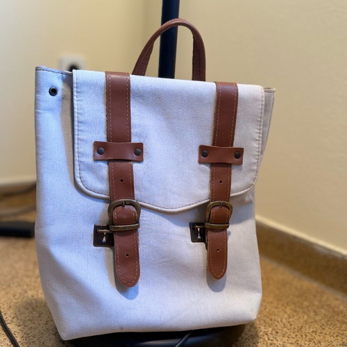 Blue backpack with brown leather details like new