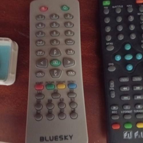 Blue Sky and Fandu TV remote controls like new, set of two