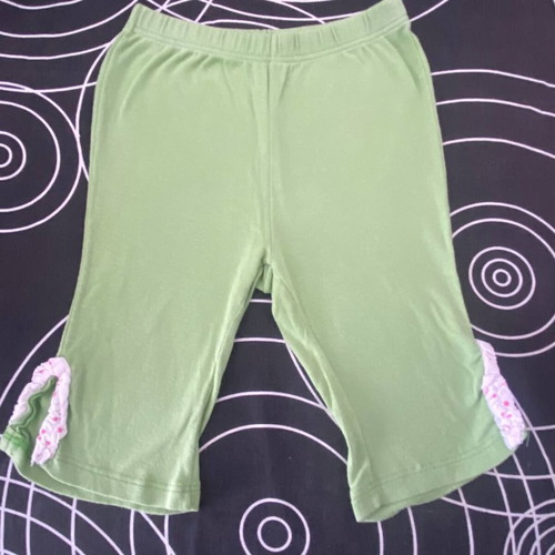 Baby girl leggings 6–12 months like new, green with ruffles