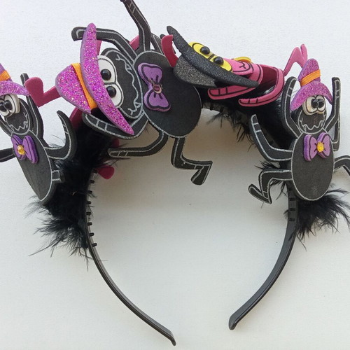 Children's Halloween headband used with spiders and feathers