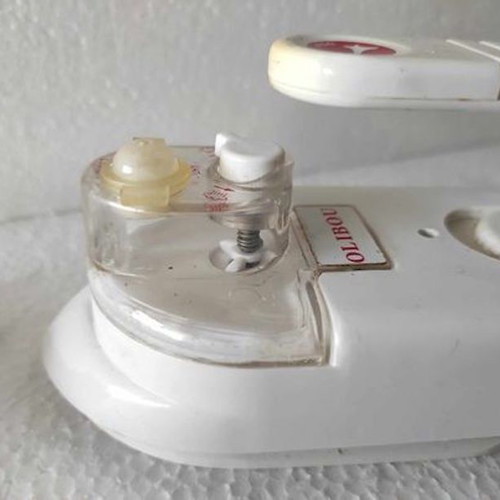 Mini travel iron like new with water and foldable design