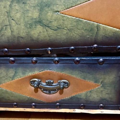 Vintage large chest with green upholstery and metal details