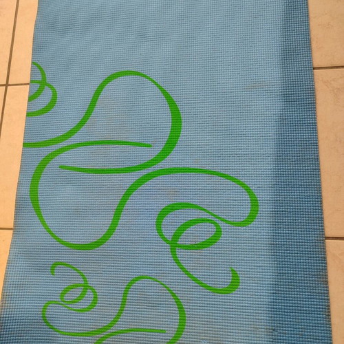 Exercise mat used with visible signs of wear