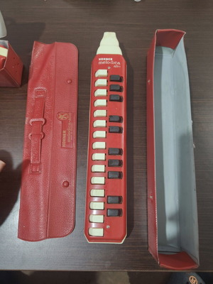 Hohner Melodica used, red with case