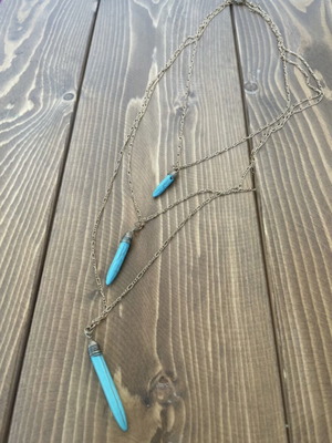 Triple necklace used, gold color