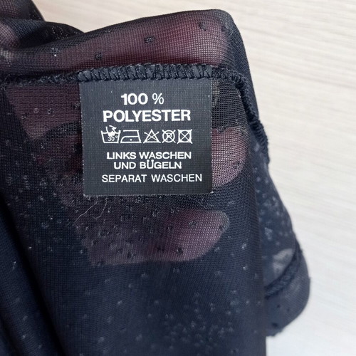 Black see through top with shimmer like new, medium to large size