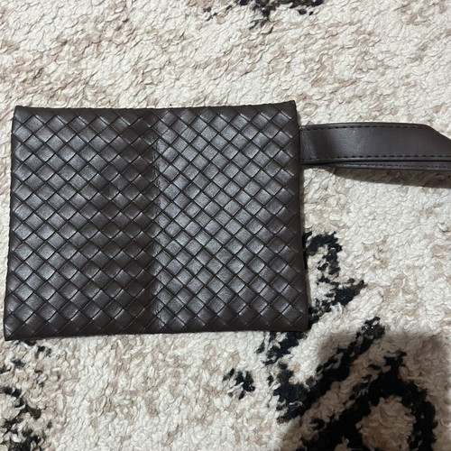 Brown knitted pouch with wrist strap like new