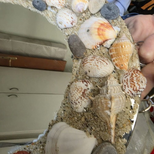 Oval mirror decorated with shells like new, handmade