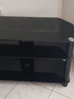 Glass TV stand like new with 3 storage levels
