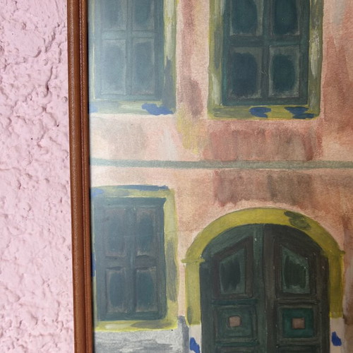 Painting of traditional building facade with arched entrance