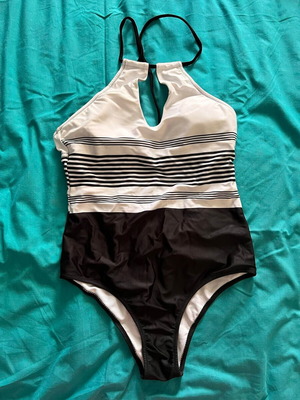 One-piece swimsuit used, size S, striped with elegant neckline