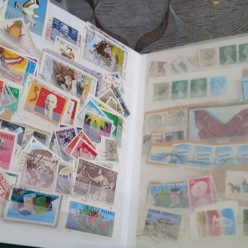 Stamps like new, collectible with two albums in storage box