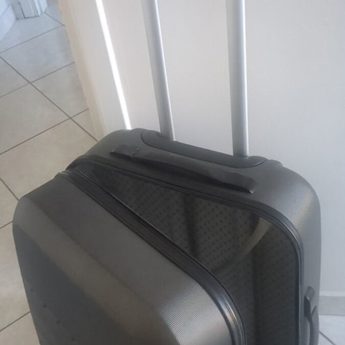 Medium hard suitcase gray used with two wheels