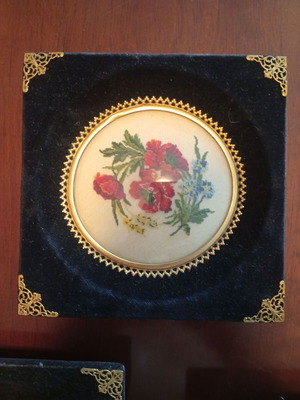 Set of 3 embroidered textile paintings in velvet frames