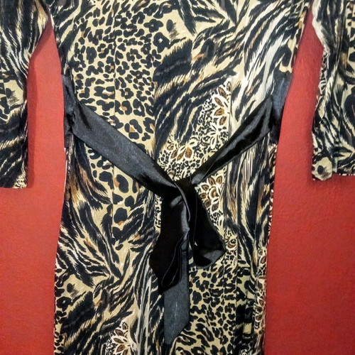 Animal print dress new with 3/4 sleeve and satin belt size medium/large