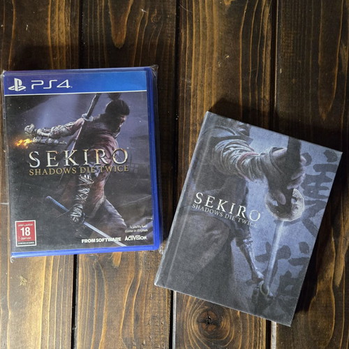Sekiro Shadows Die Twice PS4 game and artbook
