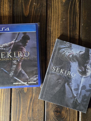 Sekiro Shadows Die Twice PS4 game and artbook