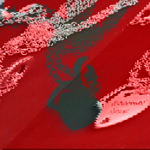 ασημένια αλυσίδα με ασημένιο κρεμαστό