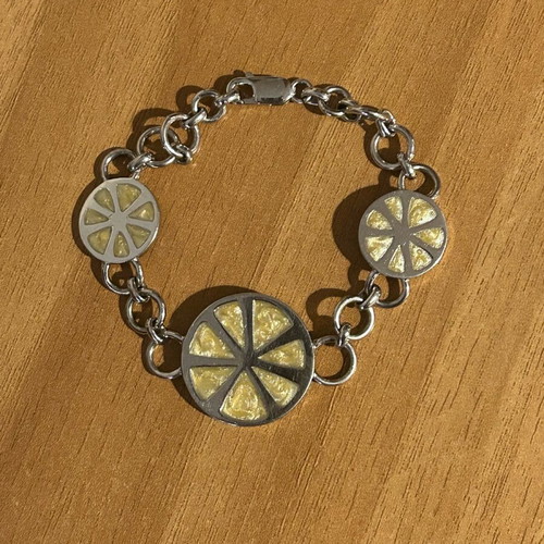 Bracelet new with adjustable size, yellow and silver