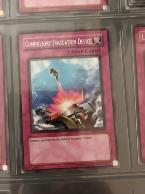 Yu-Gi-Oh card Compulsory Evacuation Device like new