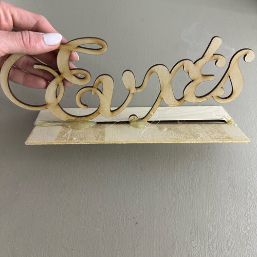 Wooden decorative stand used for wedding or baptism table decor