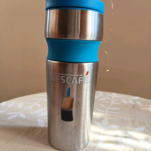 Nescafe Thermos like new with blue non-slip handle