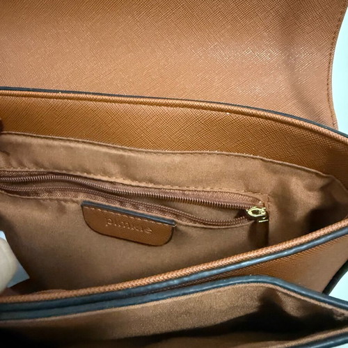 Small tan crossbody bag lightly used