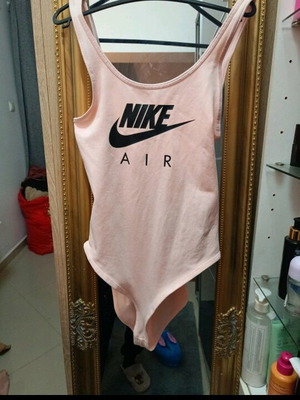Nike bodysuit pink new with tags, size XS