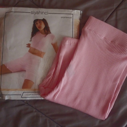 Pink shorts new with tags, elastic fit, size S
