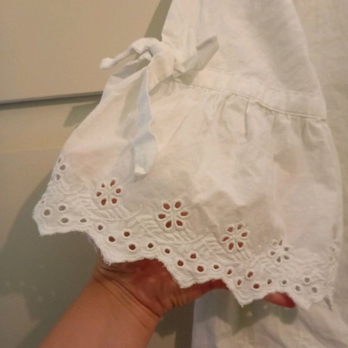 Primark white cotton blouse like new, Large with cut-out designs
