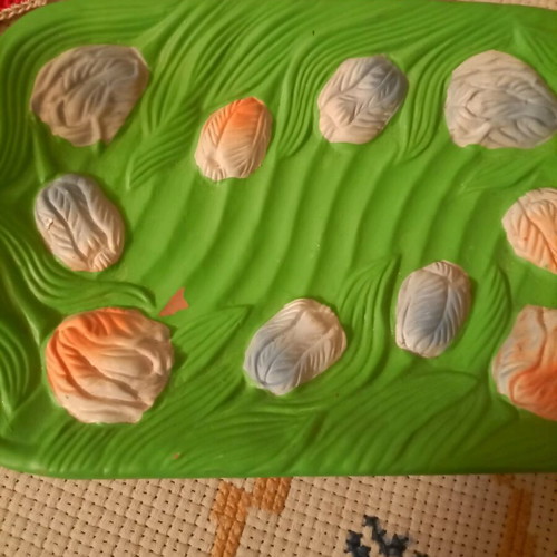 Small platter 20x12 cm like new with paper hanging eggs