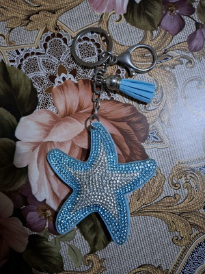 Starfish keychain like new, blue with rhinestones