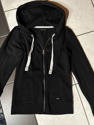 Women's black cardigan used with pockets and hood