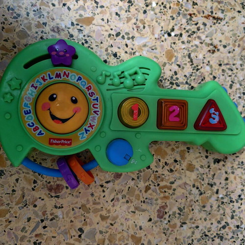Fisher Price musical guitar used with English songs