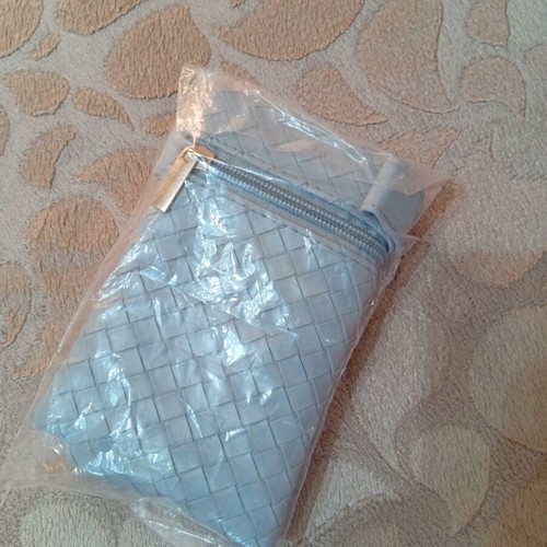 Light blue pouch and toiletry bag